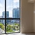 city views from floor-to-ceiling windows in living area